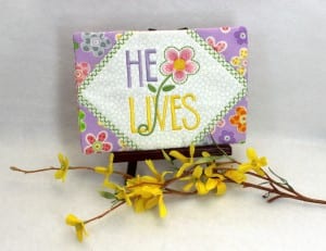 He Lives Mug Rug